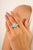 This Bold Turquoise Center Unisex Ring Framed with Sparkling Zircan handcrafted ring featuring a vibrant oval shaped...