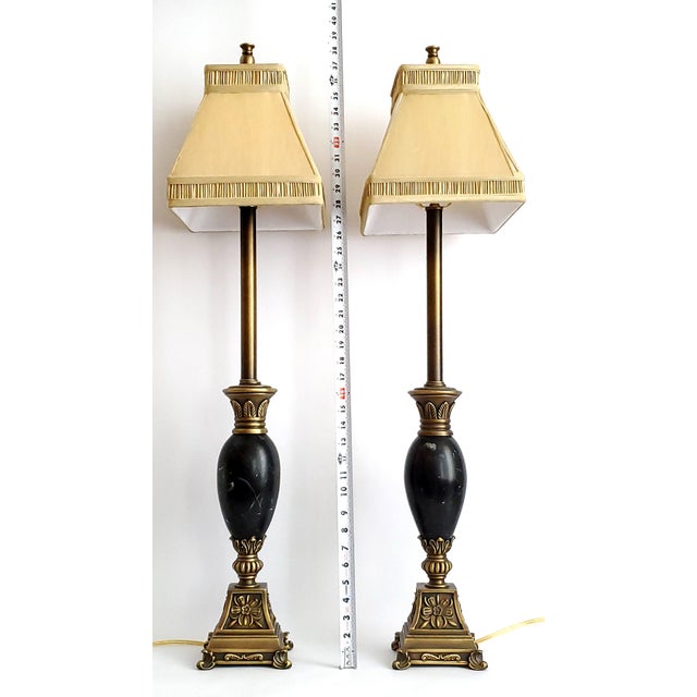 Offering a EXTRA-TALL pair of vintage Maitland Smith black marble and bronze patina buffet lamps with original silk...