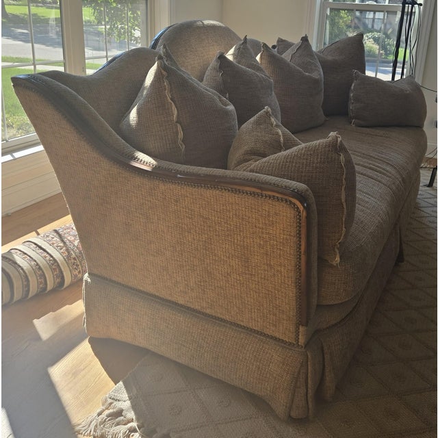 Guy Chaddock Sofa with 6 pillows included. 42 inches tall from highest point of back of sofa. 89 inches long in the back...