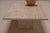 Beautifully understated rectangular travertine coffee table dating from the 1970s, distinguished by its architectural...