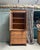 This solid pine wardrobe from the late 19th century, in the late louis-philippe style, combines storage and functionality....