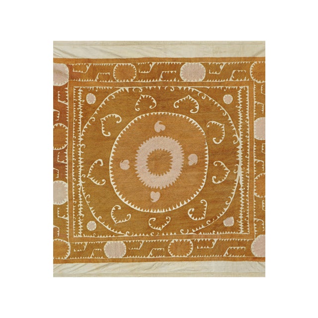 Vintage Suzani from Samarkand, circa 1900s. While this suzani is in wonderful condition, there are small stains and signs...