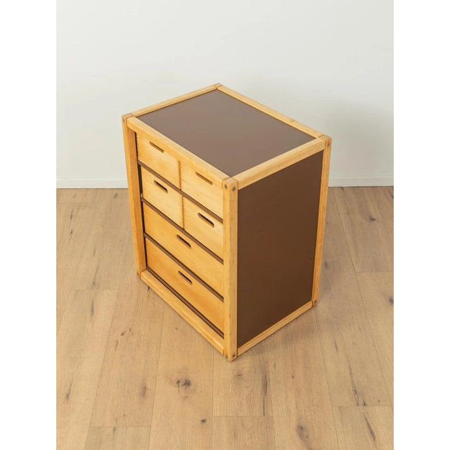 Flötotto profile system from the 1970s. A pedestal with six drawers. The frame and drawers are made of solid beech....