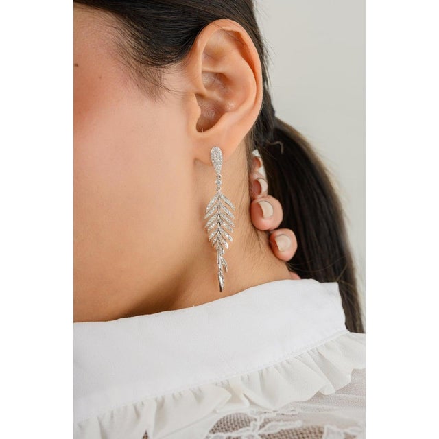 Fine Diamond Flexible Feather Dangle Drop Earrings in 18K Gold to make a statement with your look. You shall need dangle...