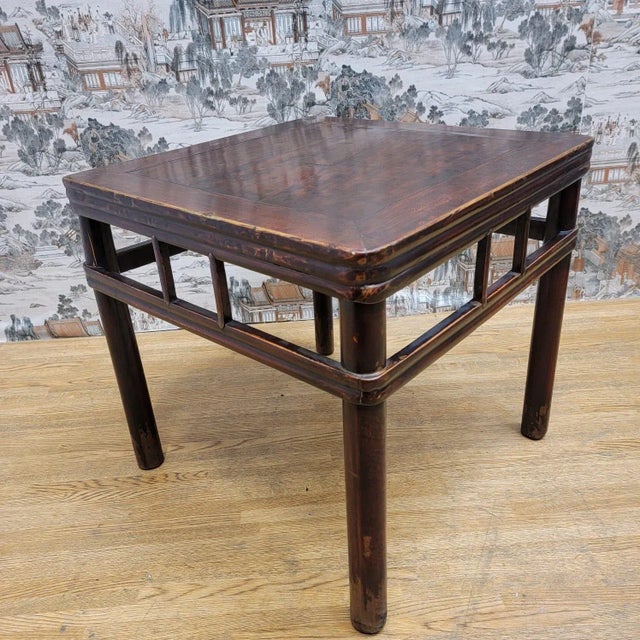Antique Shanxi Province Elmwood Accent Side Table This antique elm side table from the Shanxi Province of China has its...