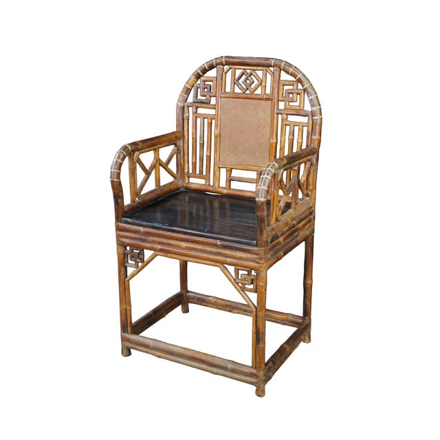 This 19th-century antique Chinese Export bamboo armchair showcases exceptional period craftsmanship, beautifully capturing...