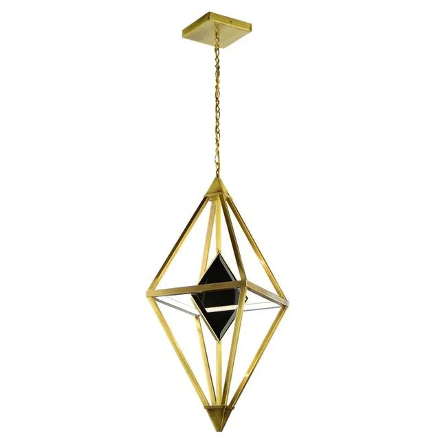 Rhomboid brass vivien suspension lamp by marioni dimensions: w 35 x d 35 x h 85 cm. Materials: brass, retro-lacquered...