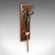 This is an antique wall gong. An English, oak and bronze dinner chime in Art Nouveau taste, dating to the late Victorian...