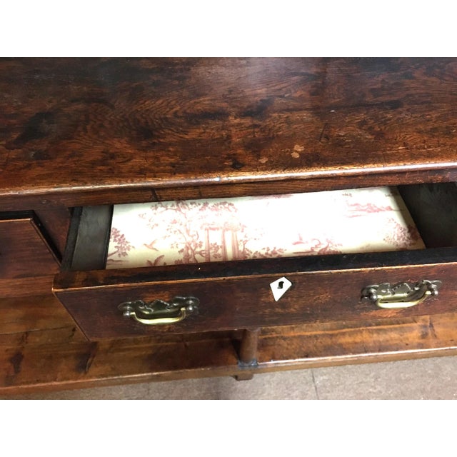 This rare stately 18th century oak cupboard is from the Wales region of Great Britain and is composed of three shelves...