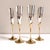 A sculptural set of vintage champagne flutes with polished silver-tone vessels and slender brass stems. Refined and...