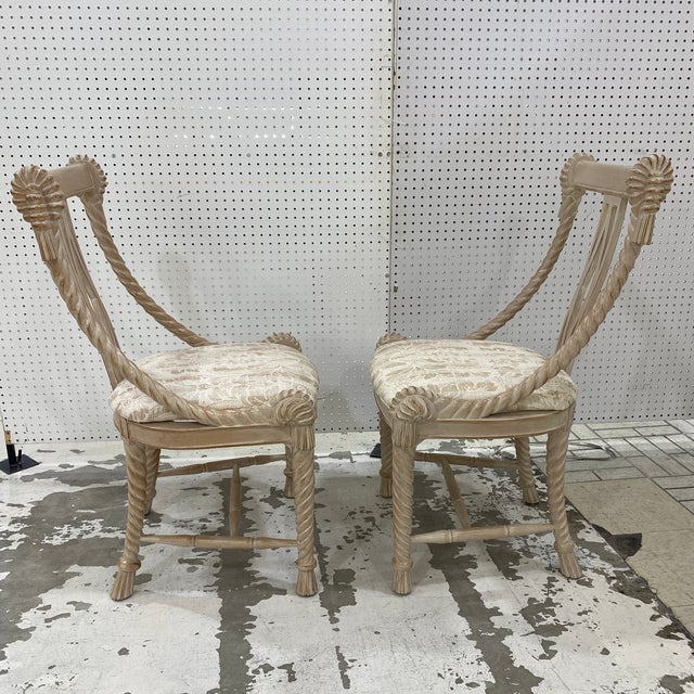 Pair of midcentury Italian style wooden rope chairs finished in a soft neutral tan, great style and stature to them, good...