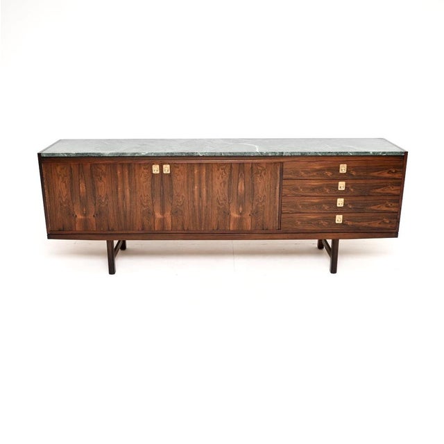 An absolutely stunning, extremely rare marble top vintage sideboard by Robert Heritage for Archie Shine. This was made in...
