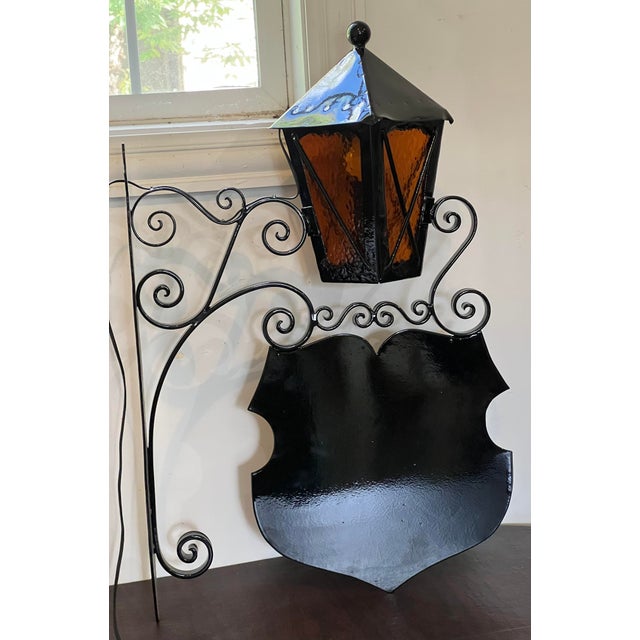 Recntly powder coated glossy black, newly wired, with original glass panels. Striking and unusual becase of the heft and...
