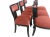 Modern set of Klismos style dining chairs. Chairs are done in a soho finish. The upholstery is a salmon colored chenille....