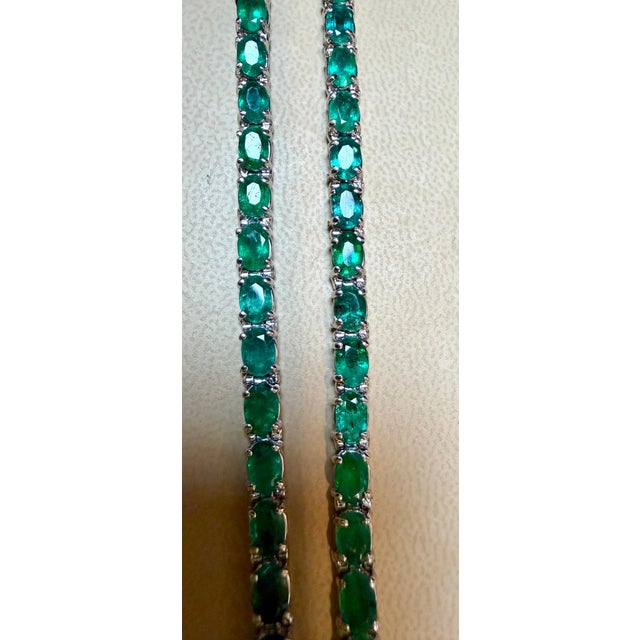 14 Carat Natural Emerald Cocktail Tennis Bracelet 14 Karat White Gold This exceptionally affordable Tennis bracelet has 27...