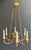 This beautiful Empire-style chandelier with 6 arms is made of chiseled bronze with golden eagle heads around a central...