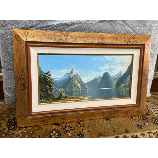 Design Plus Gallery presents a Signed and Original Painting of Mitre Peak in Milford Sound in New Zealand by Paul Cato....