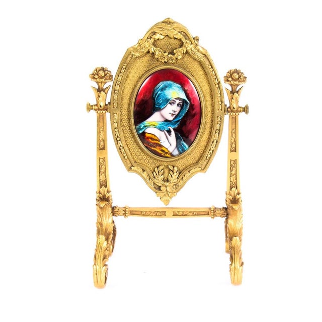This is an impressive and highly decorative French gilt bronze and Limoges enamel table mirro, Signed, F.Bienvue, Limoges...