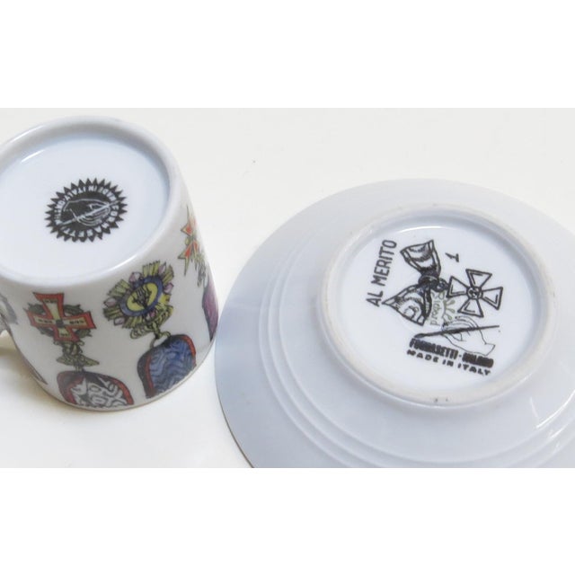 White 1960's Fornasetti Art/Design on Richard Ginori Fine Porcelain - Al Merito Cup and Saucer For Sale - Image 8 of 12