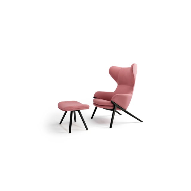 Patrick norguet p22 set of armchair and footrest for cassina a design armchair with timeless appeal that puts a...