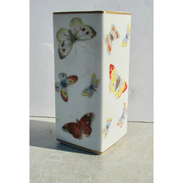 Beautiful Limoges porcelain square pillar vase covered with butterfly patterns. A great many varieties and colors across...