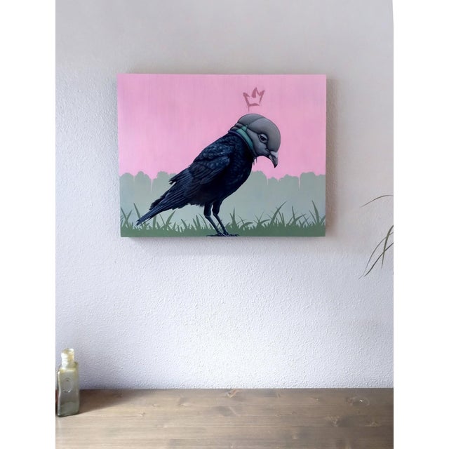 The artwork features a stylized bird adorned with a mask, set against a vibrant pink background that contrasts sharply...