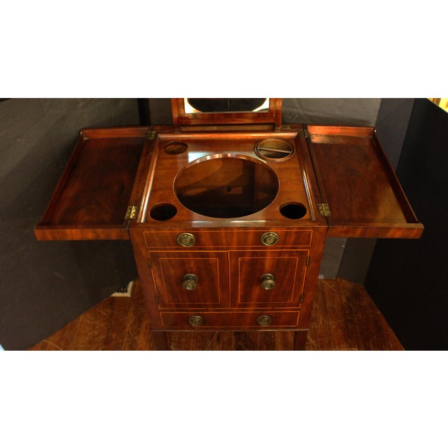 Late 18th-early 19th century Beau Brummel or gentleman's dressing table, English. Outstanding quality. Retains copper...