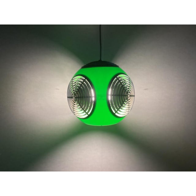 Vintage Ufo Ceiling Lamp in Green Plastic and with Black Grids from Massive Lighting, 1970s, in Good conditions. Designed...