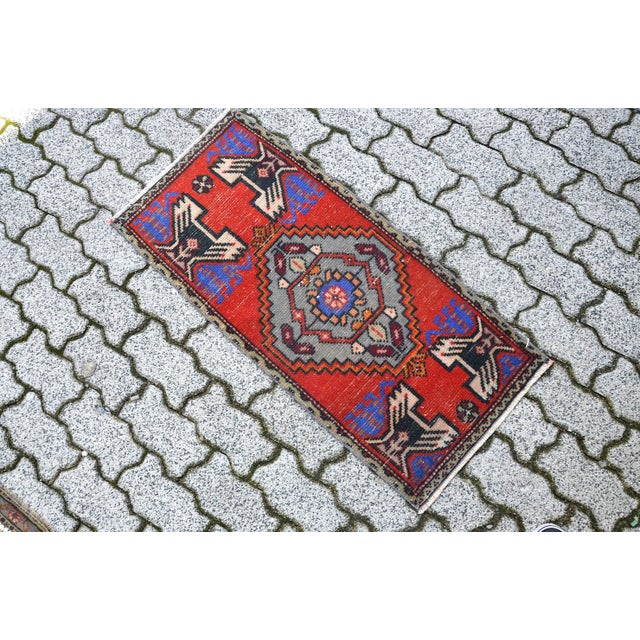 This is a vintage Turkish Oushak rug from the 1960s. The piece was hand-knotted.