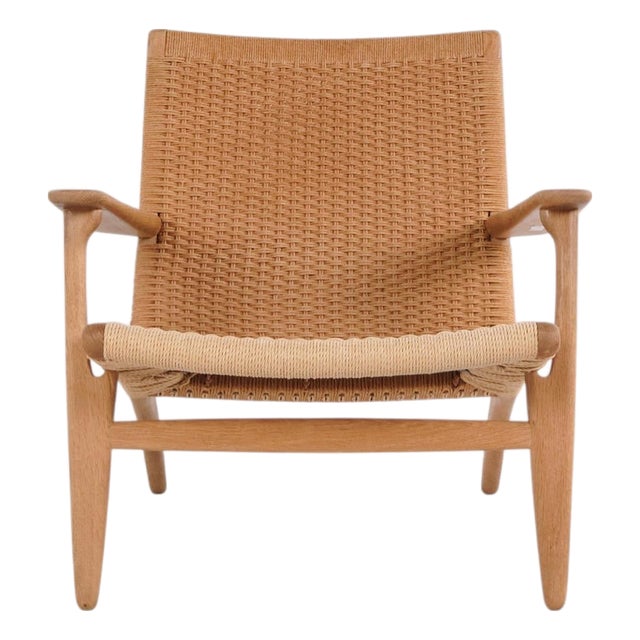 CH25 Lounge Chair in Patinated Oak and Woven Paper Cord by Hans J. Wegner, 1980s For Sale