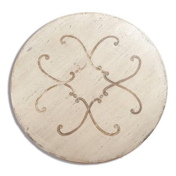 Handcrafted in Italy from solid wood, this round dining table offers a beautifully timeworn interpretation of classic...