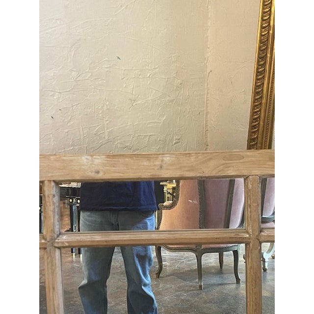 Vintage French Gesso pine mirror. Created from window fragments that have been stripped and and made into a mirror....