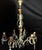 Chandelier made of brass, copper and crystal, 1940s in 6 light points, bulbs with a large E 27 thread. Very beautiful...