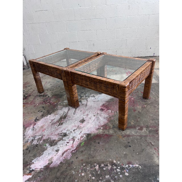 Vintage rattan side or end tables or small coffee table with glass tops. Made in America in the late 1980s A smaller...