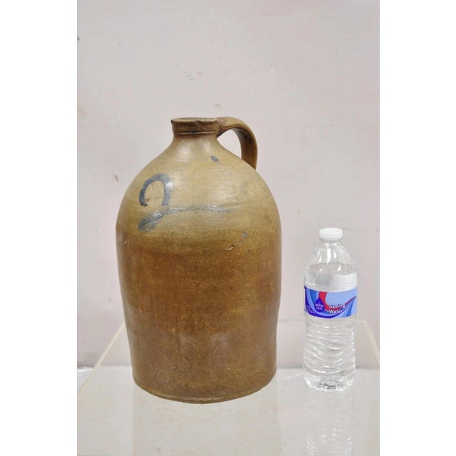 Antique Stoneware Pottery 2 Gallon Water Jug Pitcher with Cobalt Blue Painted "2". Circa Late 19th Century. Measurements:...