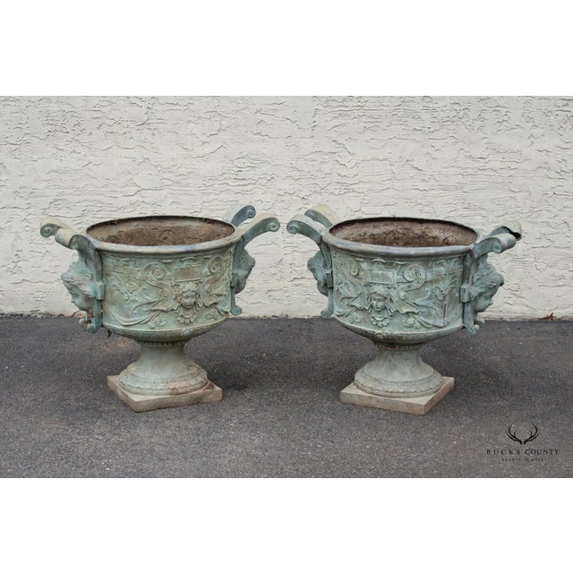 High Quality Antique Early 20th Century Pair of Patinated Lead Alloy Outdoor Planters or Garden Urns with Figural Decoration