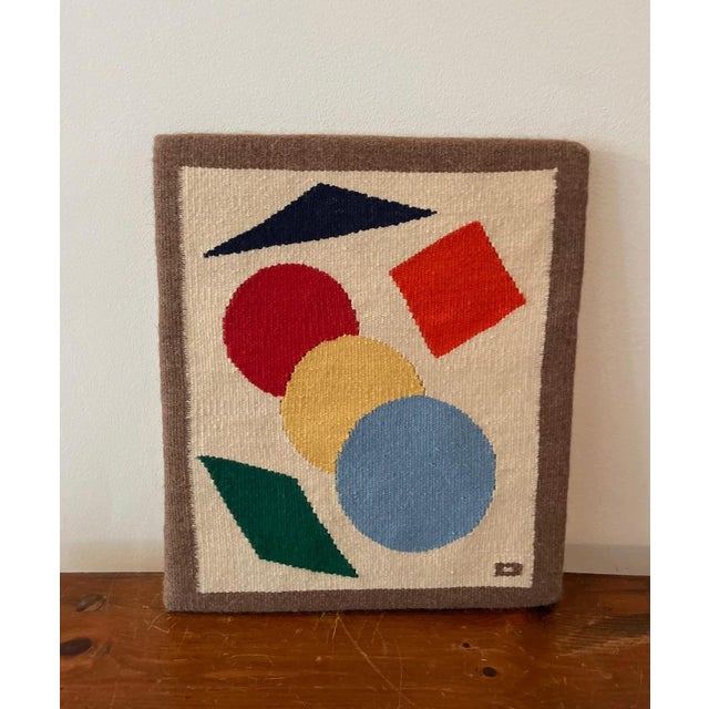 Modern weaving by artist Dick Bailey. Shapes that captivate the imagination. Custom hanging hardware on back along with...