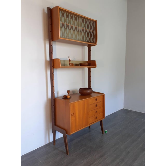 Mid-Century Scandinavian Teak Storage Unit from Ergo, 1960s, in Restored conditions. Designed 1960 to 1969 I have official...