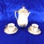 This is Vignaud Feres Limoges Chocolate pot. It is white bisque with a matte finish and a lot of gold trim. It comes with...