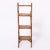 Standout 19th century English stand handcrafted in bamboo with a burnt bamboo faux tortoise finish having three tiers...