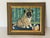Puppy dog sitting with his ball oil painting on board, framed in gold tone frame.
