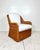 Vintage Wicker Works style woven wicker rattan lounge chair. Thick woven reeds with braided trim. Removable cushions.