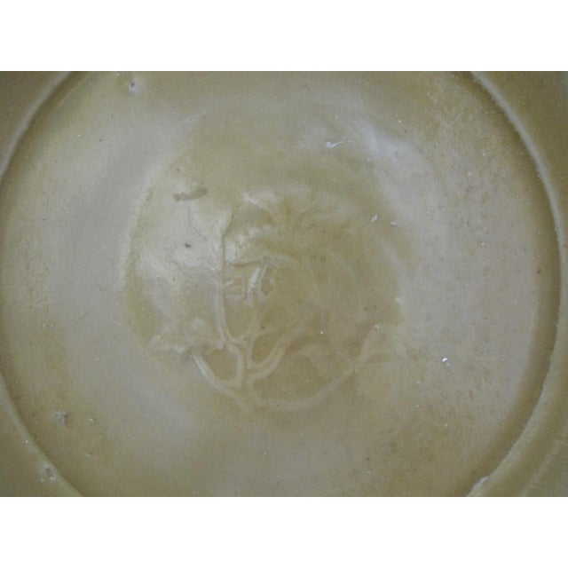 Chinese Yuan Dynast Longquan style celadon shallow bowl. This is an antique, most likely 19th century piece created to...