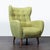 This stylish lounge chair from Article features a mid-century modern design with a soft green fabric and button-tufted...