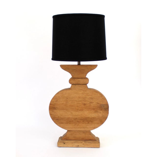 French vintage oak monumental table lamp in the style of Jean-Charles Moreux. An architectural statement lamp in natural...