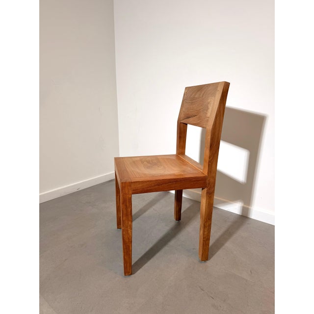 Beautiful set of six solid teak dining chairs featuring a clean contemporary design and exceptional craftsmanship....