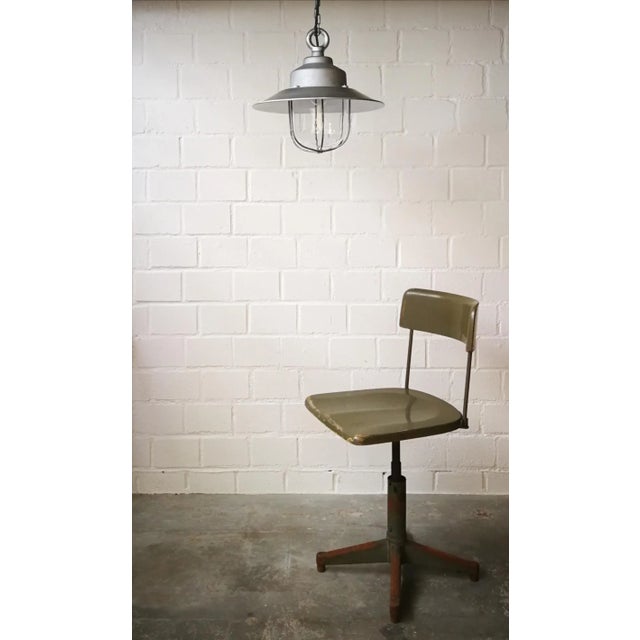This Legrand steel and aluminium ceiling lamp dates from the 1950s and was recovered from the warehouse of a former coking...