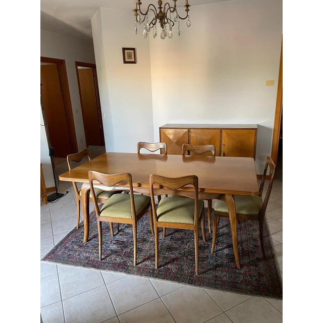 Wooden table with 6 wooden chairs and green upholstery produced by Valzania. Very good condition, requires light...