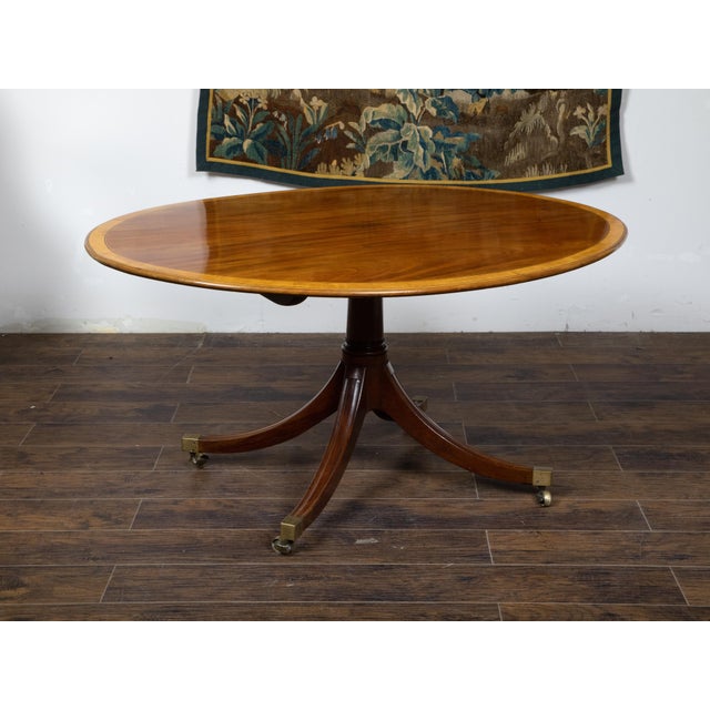 Wood English Mahogany 1840s Oval Top Pedestal Table with Quadripod Base and Casters For Sale - Image 7 of 12