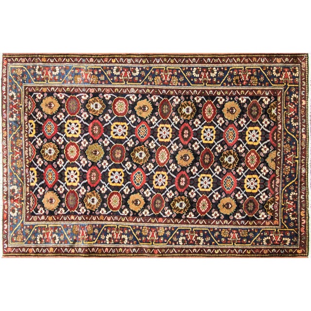 This handsome antique Persian Bakhtiari rug, woven around 1890, is a richly colored and highly decorative example of late...